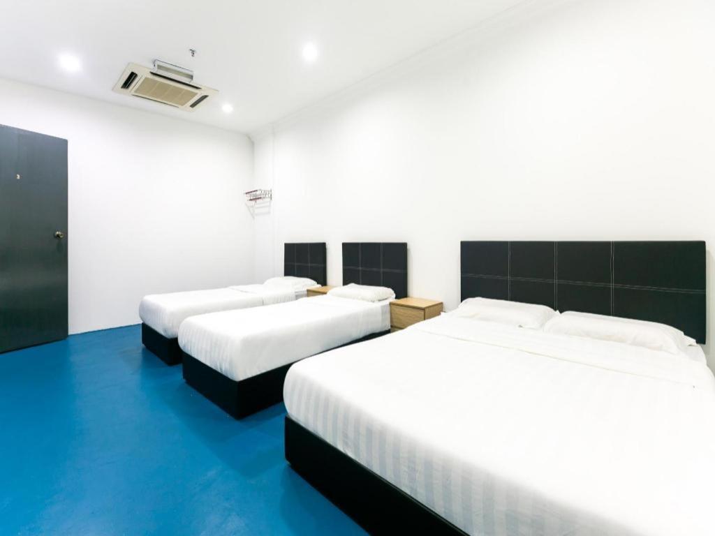 Spot On 89726 Capsule Inn Kota Kinabalu Bagian luar foto