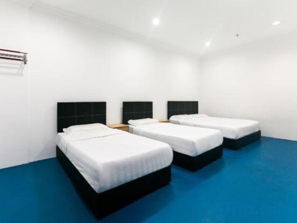 Spot On 89726 Capsule Inn Kota Kinabalu Bagian luar foto